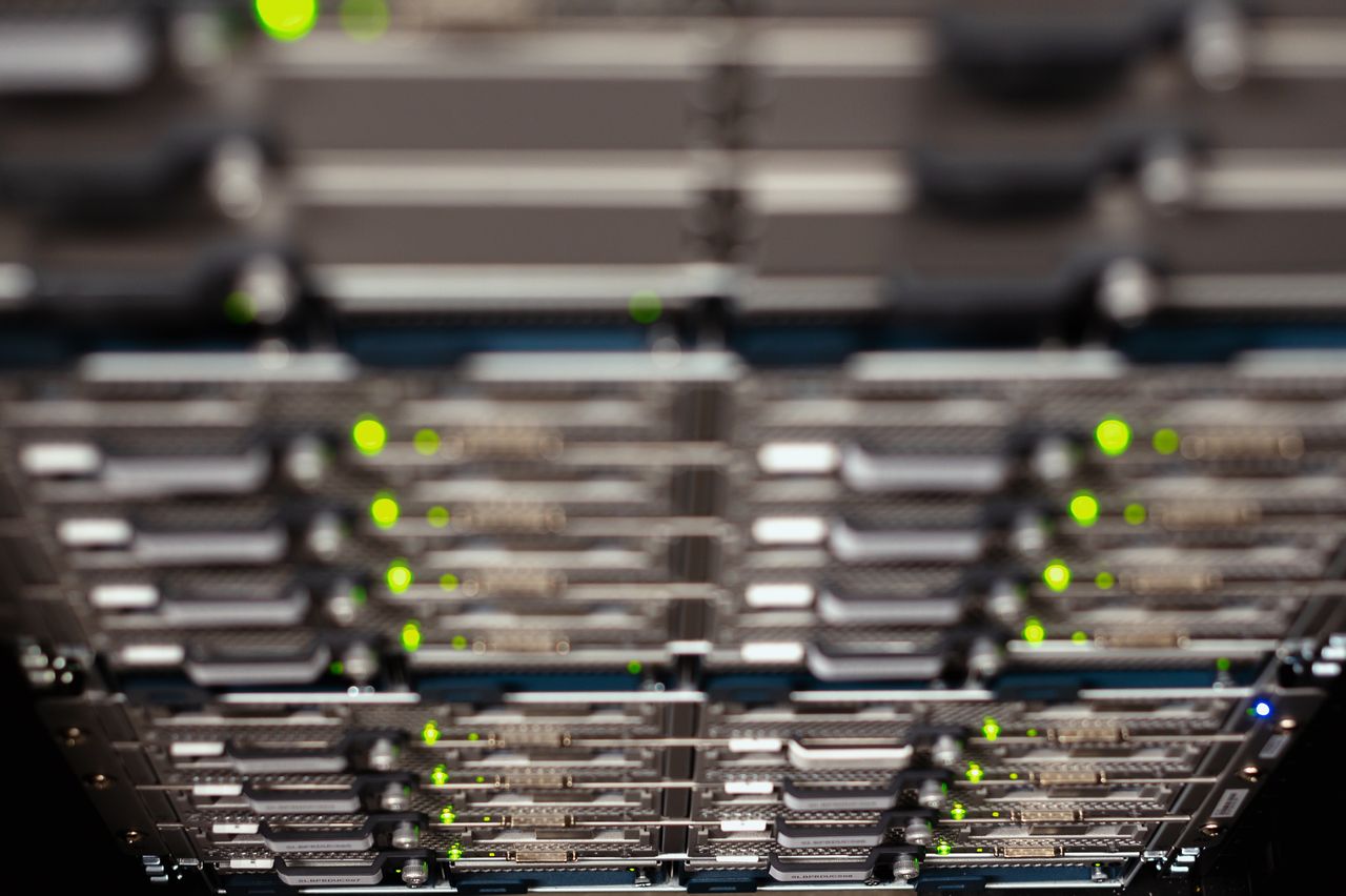 services-03 From above contemporary server cable trays without wires located in modern data center